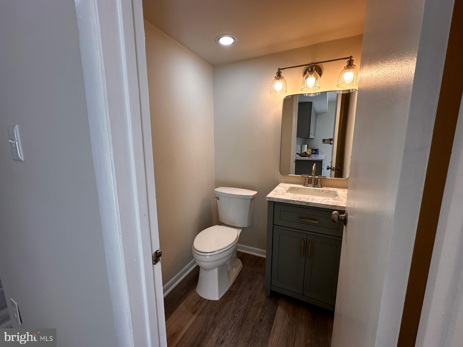 12800 Asbury Drive Fort Washington, MD 20744 - Photo 23 of 53 a bathroom with a sink and a mirror