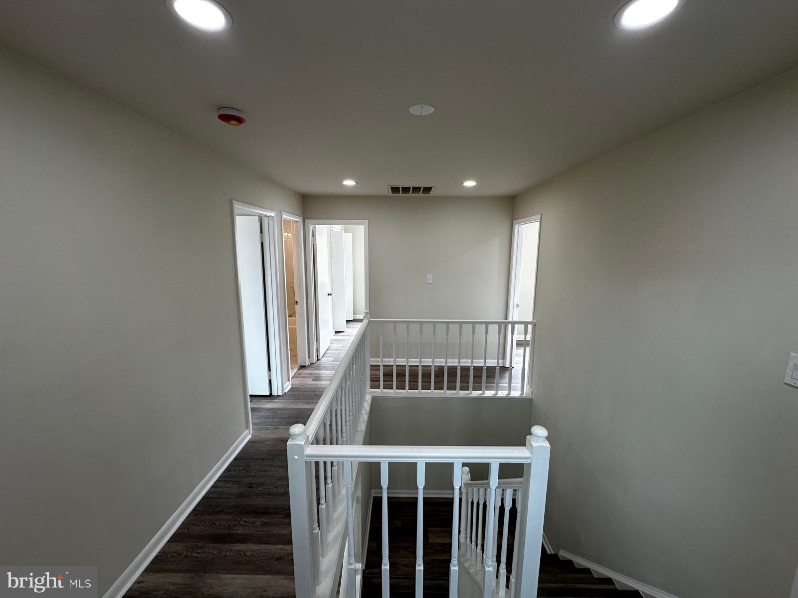 12800 Asbury Drive Fort Washington, MD 20744 - Photo 26 of 53 a view of entryway and hall with wooden floor