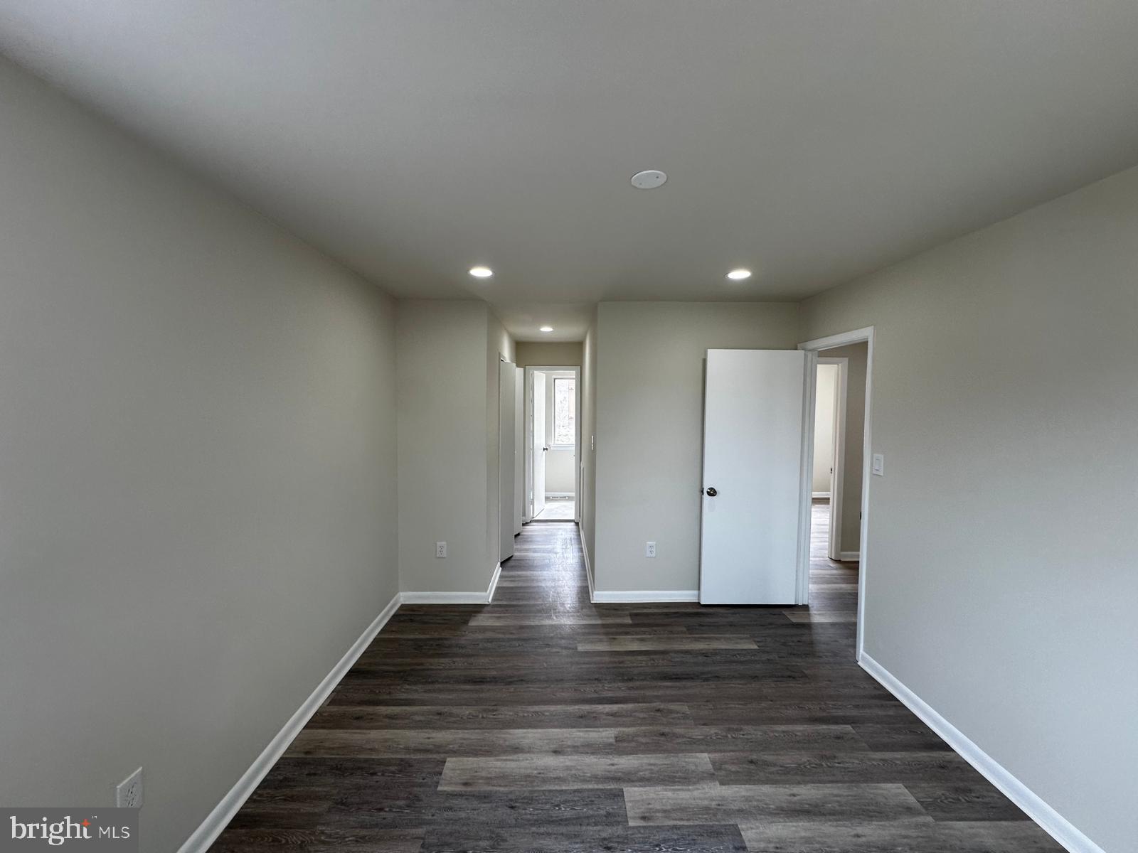 12800 Asbury Drive Fort Washington, MD 20744 - Photo 27 of 53 a view of an empty room with wooden floor