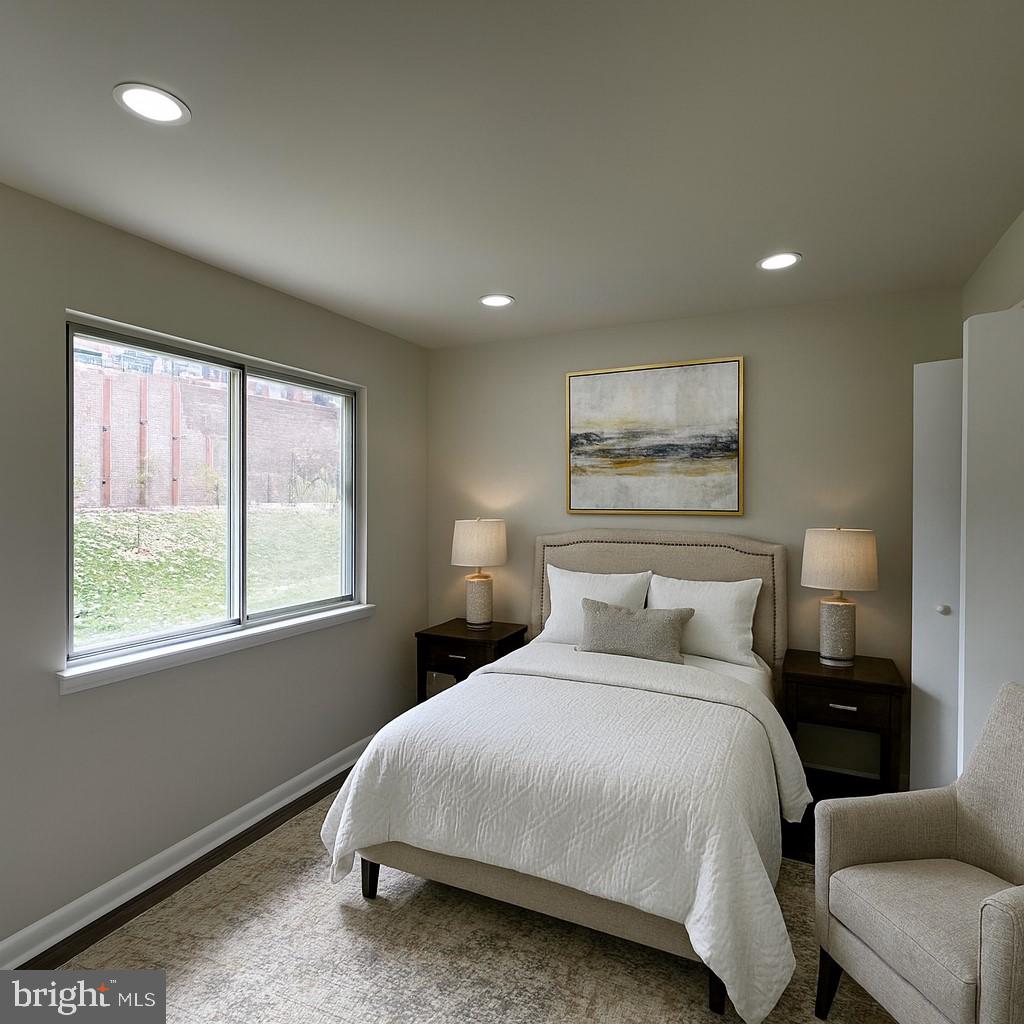 12800 Asbury Drive Fort Washington, MD 20744 - Photo 34 of 53 a bedroom with a bed and a large window