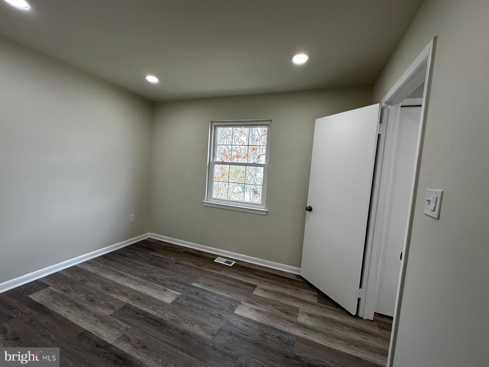 12800 Asbury Drive Fort Washington, MD 20744 - Photo 36 of 53 a view of room with window and hardwood floor