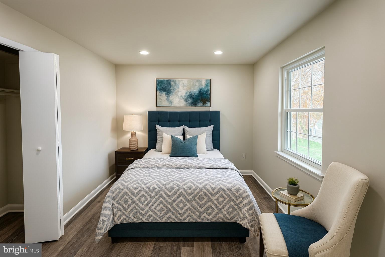 12800 Asbury Drive Fort Washington, MD 20744 - Photo 37 of 53 a bedroom with a bed and wooden floor