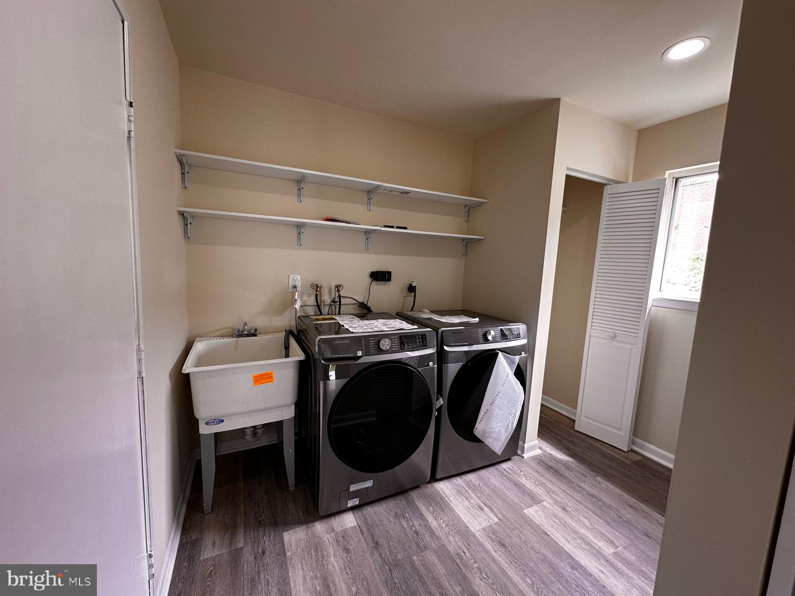 12800 Asbury Drive Fort Washington, MD 20744 - Photo 43 of 53 a storage room with wooden floor and furniture