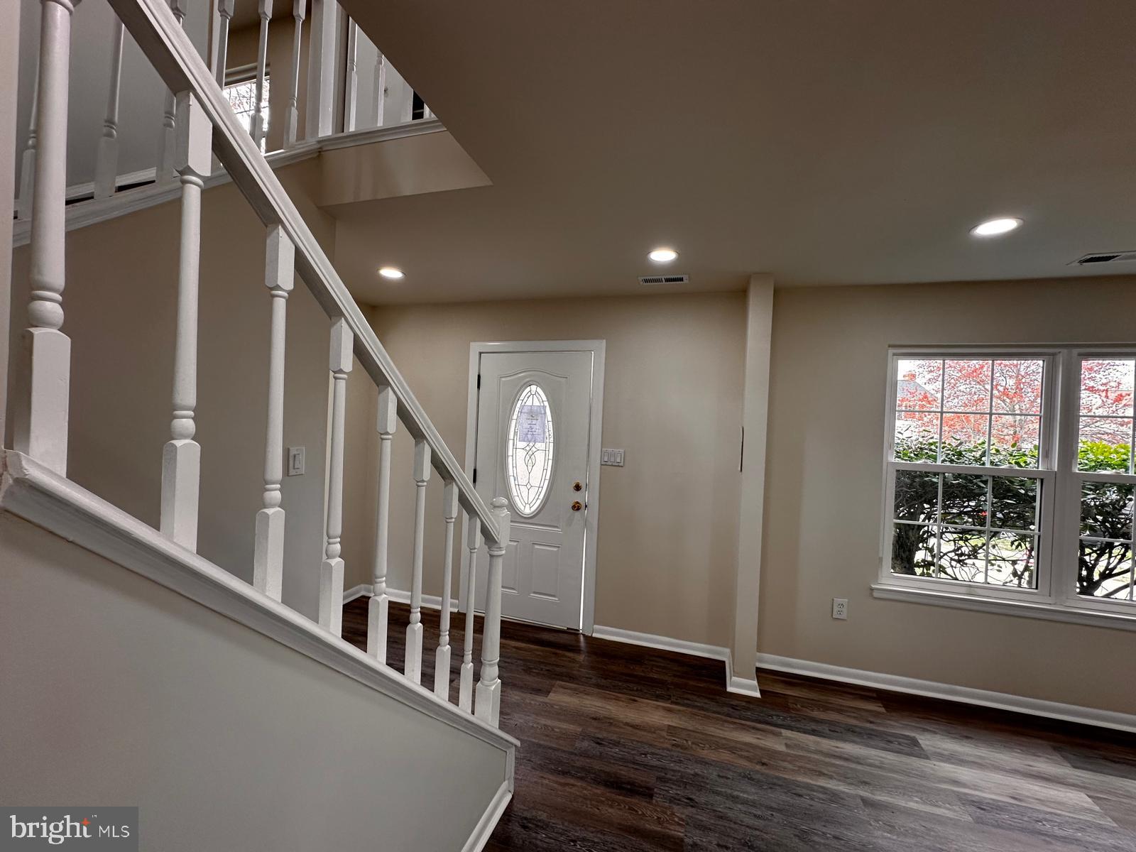 12800 Asbury Drive Fort Washington, MD 20744 - Photo 7 of 53 a view of entryway with wooden floor and front door