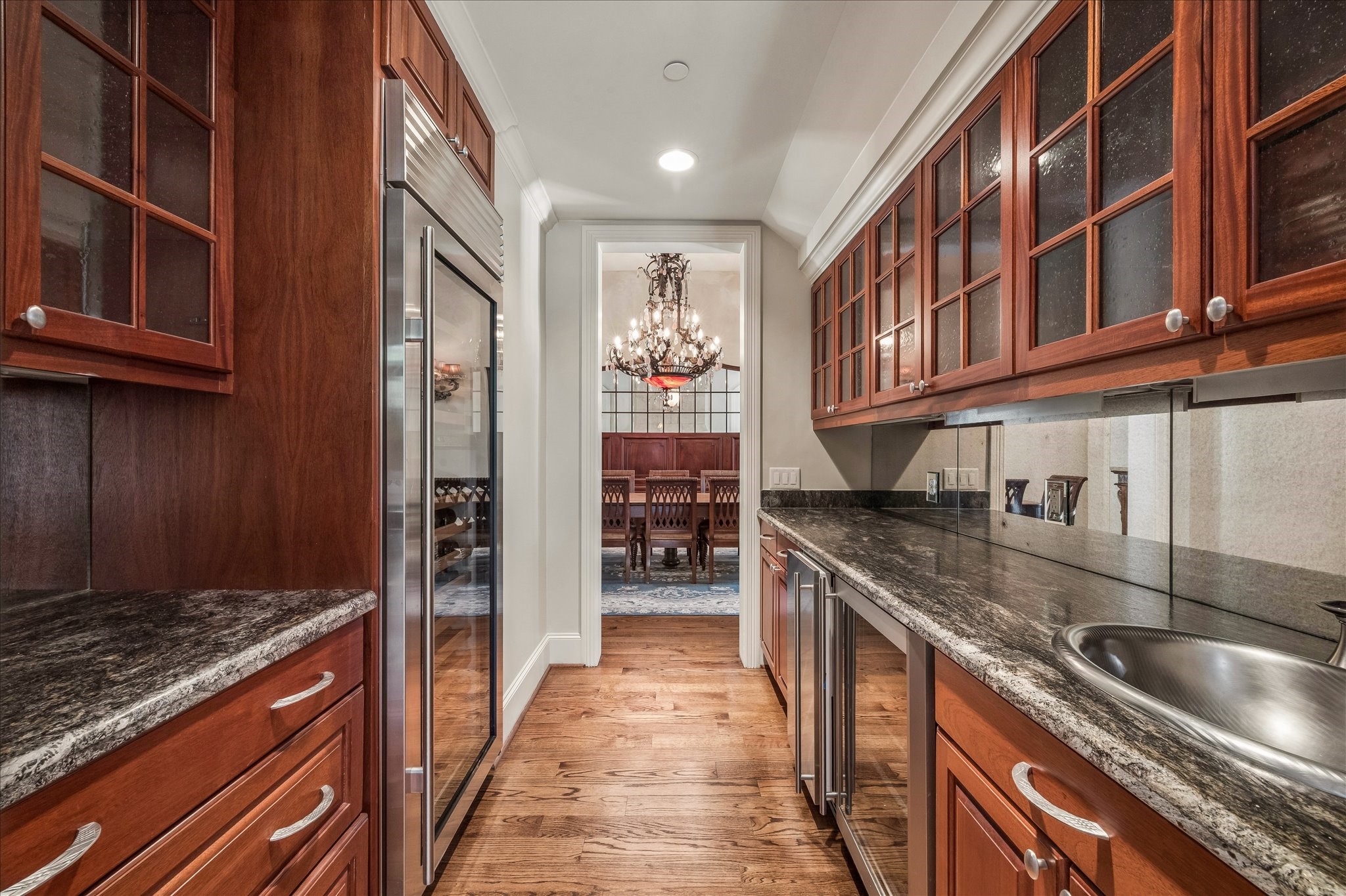 802 Country Lane Houston, TX 77024 - Photo 13 of 34 a kitchen with a sink and a stove top oven