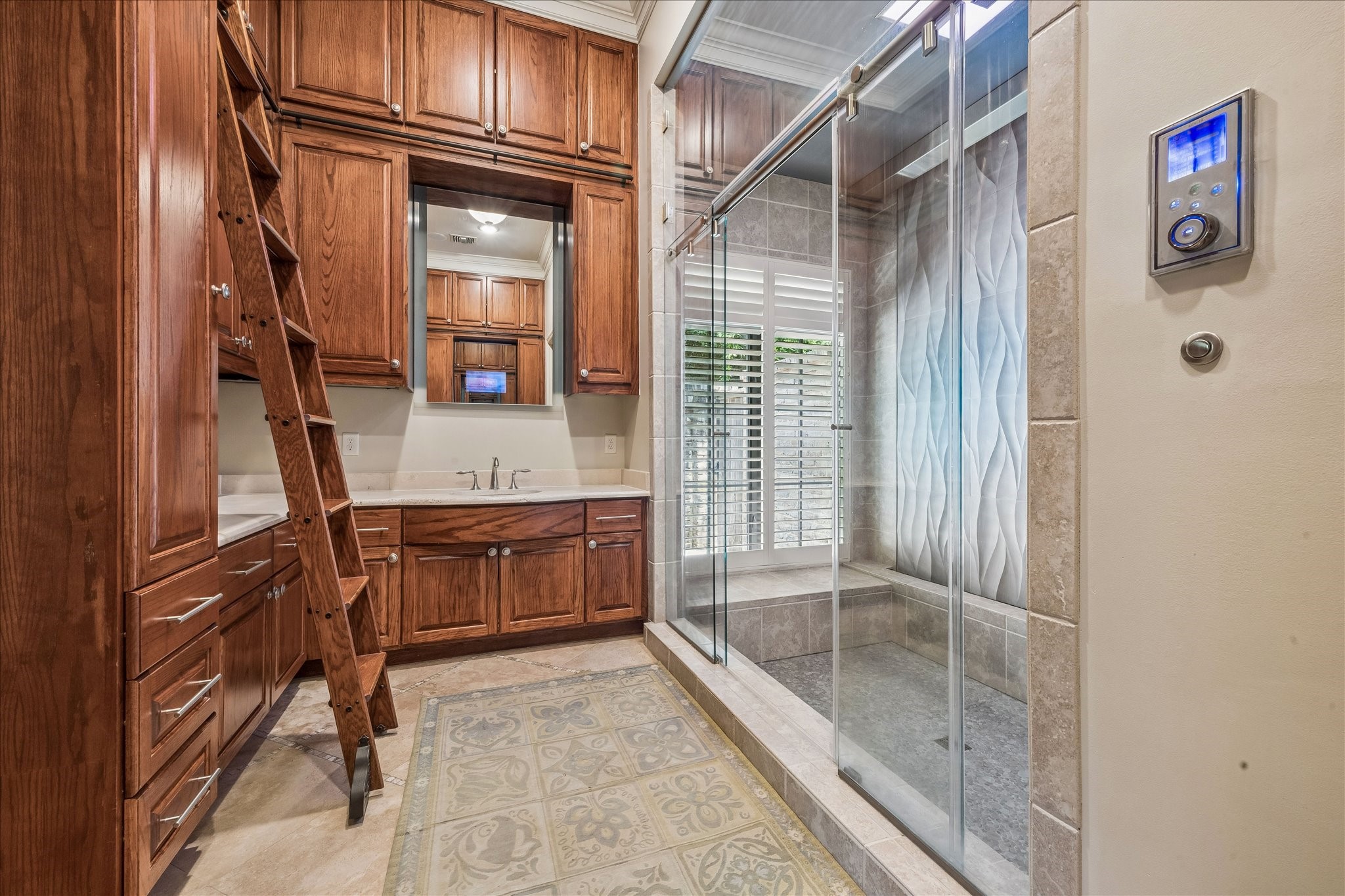 802 Country Lane Houston, TX 77024 - Photo 18 of 34 a bathroom with a tub and a sink
