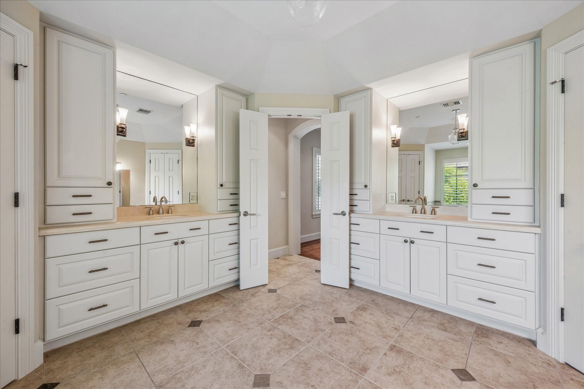 802 Country Lane Houston, TX 77024 - Photo 23 of 34 a spacious bathroom with a granite countertop sink mirror and a