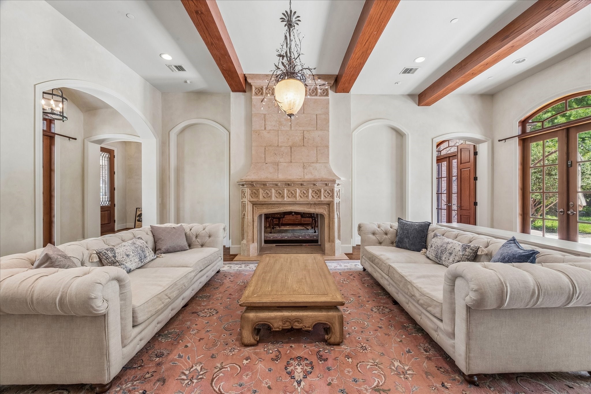 802 Country Lane Houston, TX 77024 - Photo 5 of 34 a living room with furniture and a fireplace