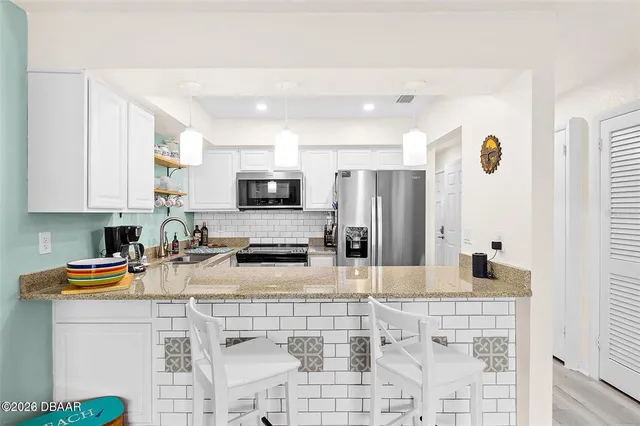 $220,000 | 3615 South Atlantic Avenue, Unit 210, Daytona Beach, FL 32118