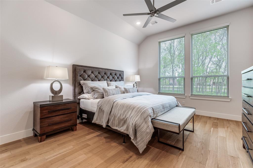 1835 Bell Court Van Alstyne, TX 75495 - Photo 4 of 39 Private primary suite with serene greenbelt views in this thoughtfully designed single story Highland Homes build