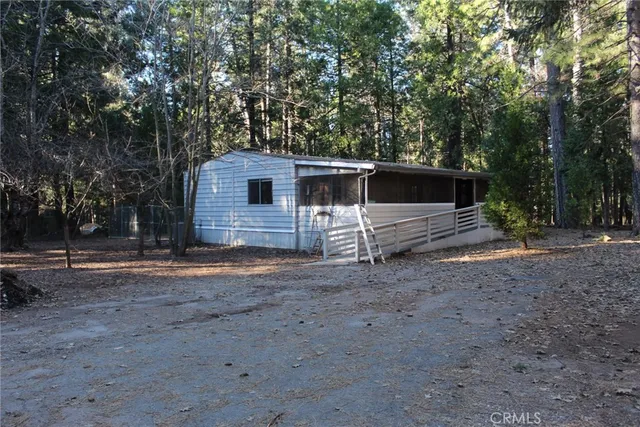 a view of hallway with wooden floor