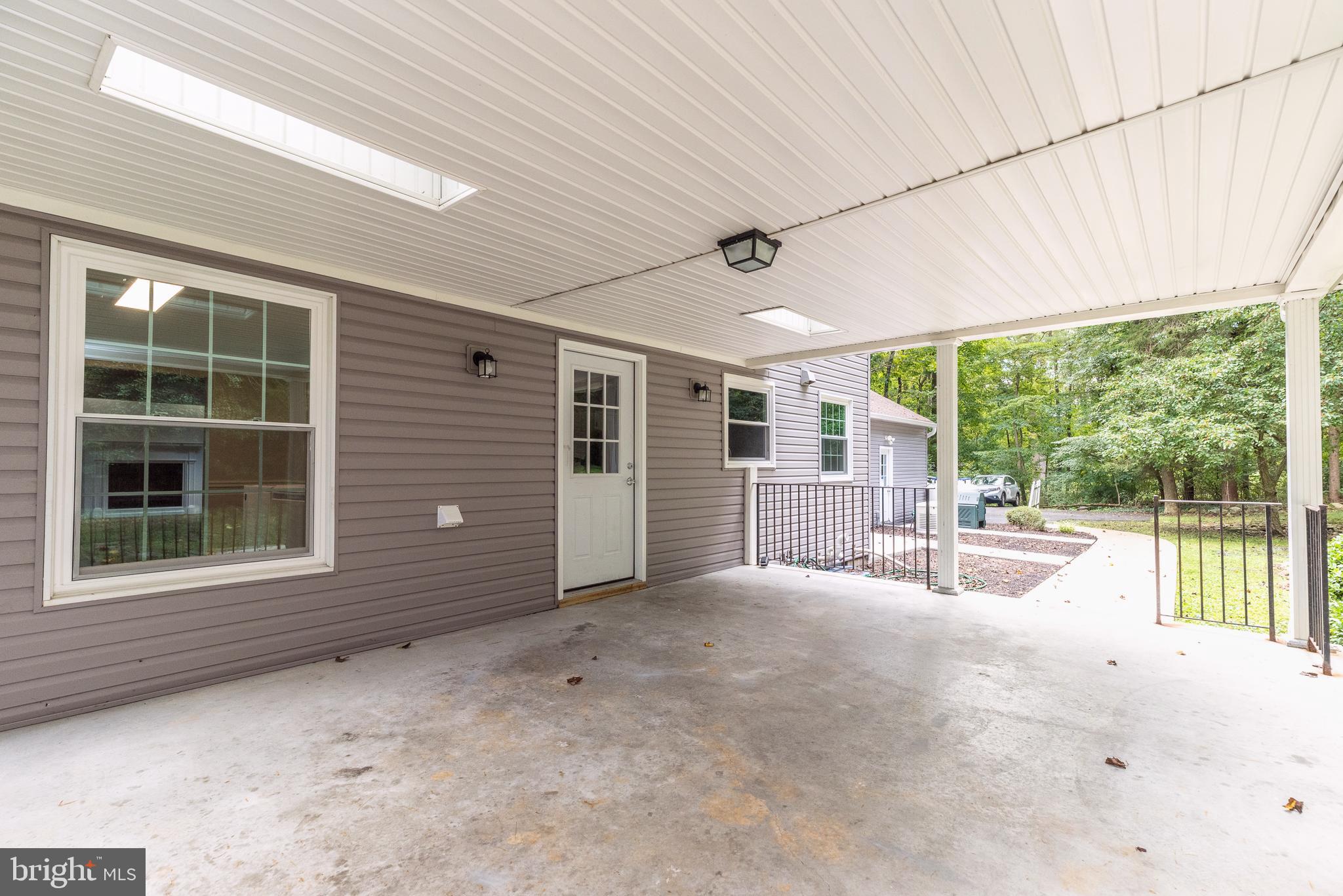 141 Indiantown Road Glenmoore, PA 19343 - Photo 55 of 63 Covered concrete Patio with Skylights