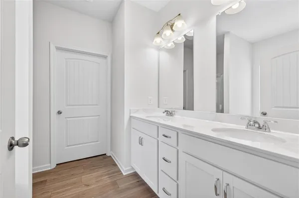 a white bath tub sitting next to a window