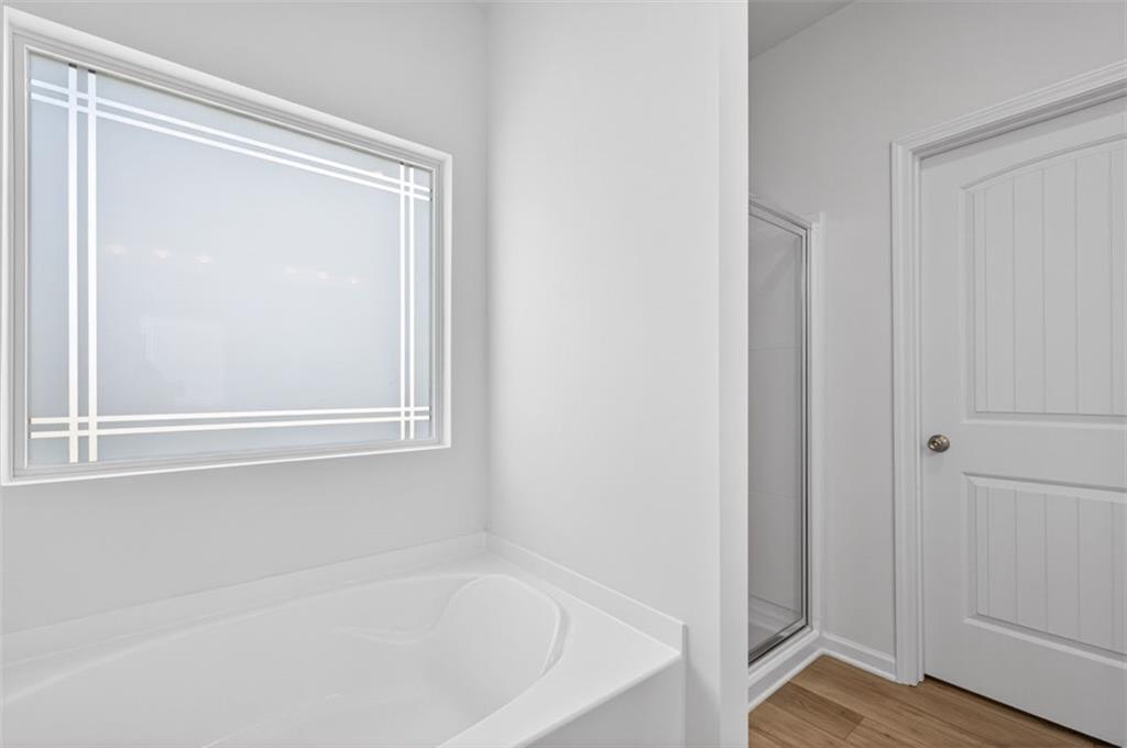 723 Sinclair Lane Temple, GA 30179 - Photo 23 of 40 a white bath tub sitting next to a window