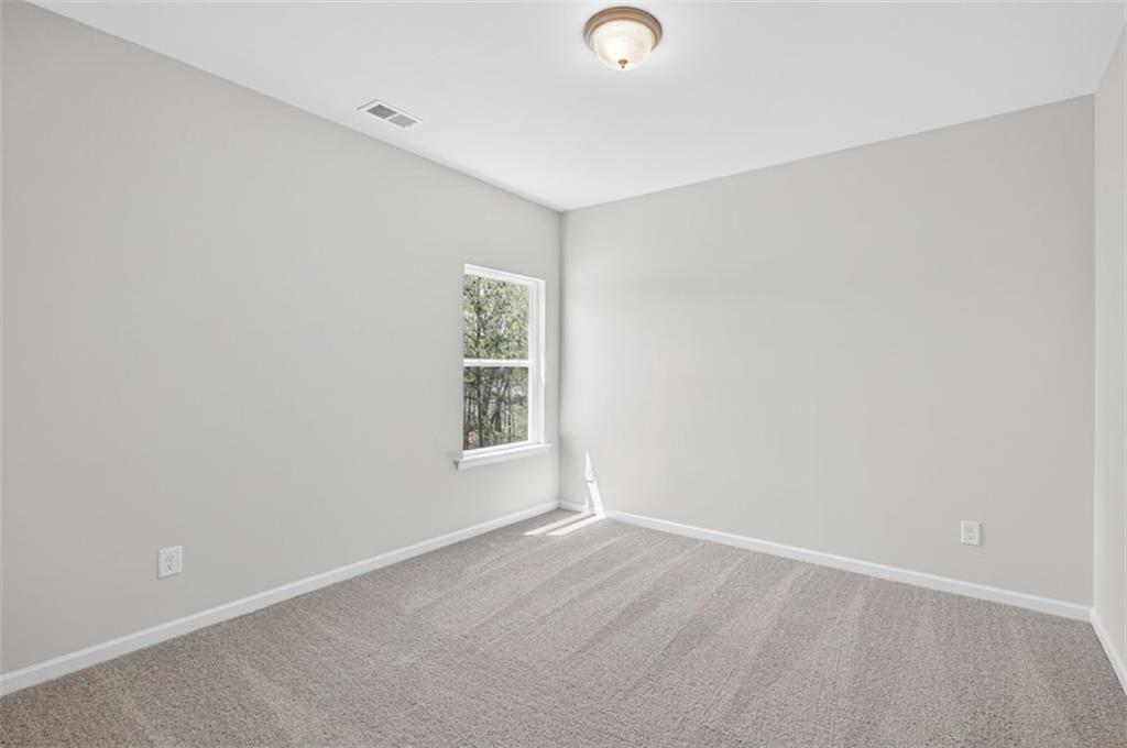 723 Sinclair Lane Temple, GA 30179 - Photo 34 of 40 an empty room with a window