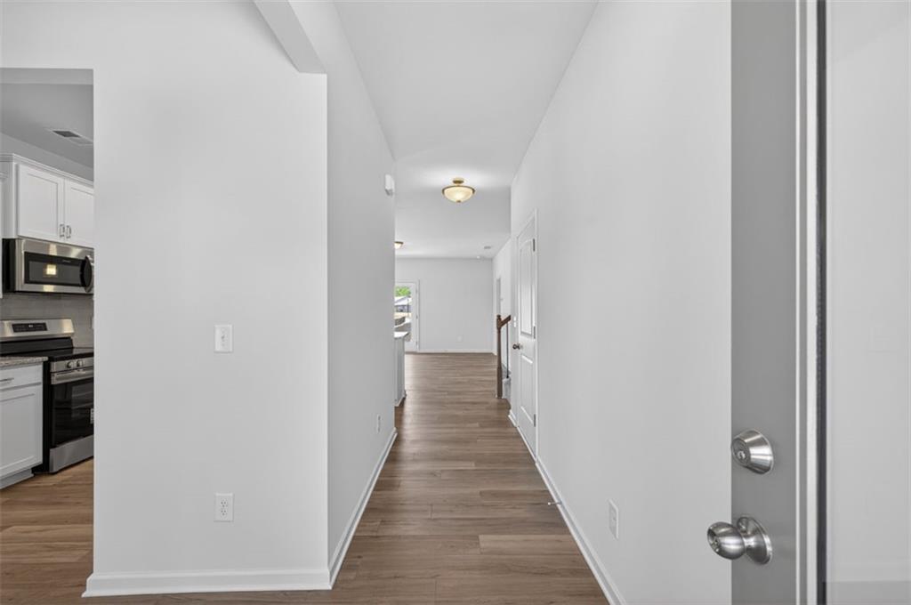 723 Sinclair Lane Temple, GA 30179 - Photo 4 of 40 a view of a hallway with a closet and a window