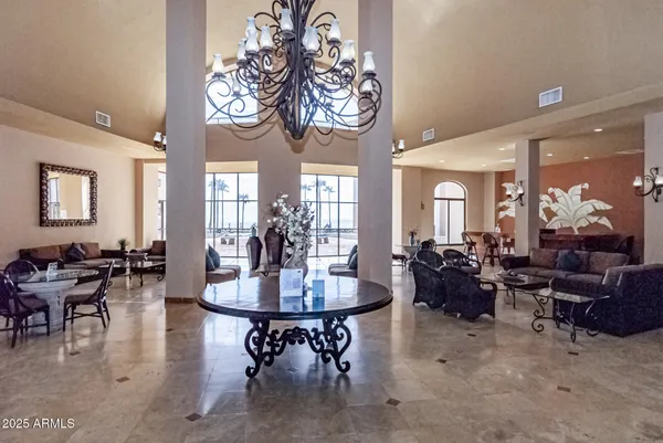 a view of a livingroom with furniture and closet
