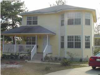 60 Don Graff Road Freeport, FL 32439 - Photo 1 of 15 a front view of a house with a porch
