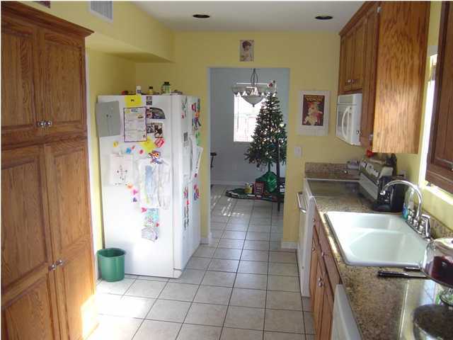60 Don Graff Road Freeport, FL 32439 - Photo 12 of 15 a kitchen with a refrigerator and a sink