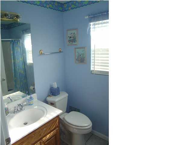 60 Don Graff Road Freeport, FL 32439 - Photo 15 of 15 a bathroom with a sink and a toilet