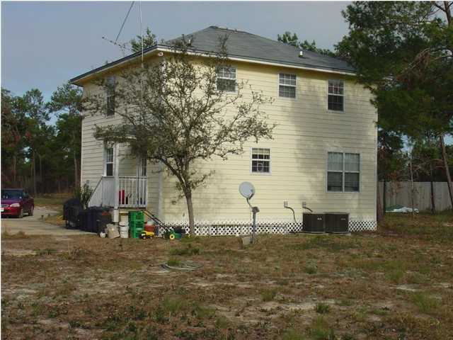 60 Don Graff Road Freeport, FL 32439 - Photo 2 of 15 a view of backyard of house
