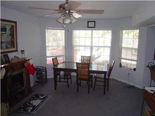 60 Don Graff Road Freeport, FL 32439 - Photo 6 of 15 a view of a dining room with furniture and a window