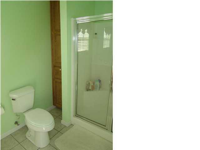 60 Don Graff Road Freeport, FL 32439 - Photo 10 of 15 a bathroom with a toilet and a shower