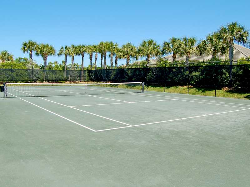 1185 River Wind Circle Vero Beach, FL 32967 - Photo 19 of 29 a view of an outdoor space and tennis court