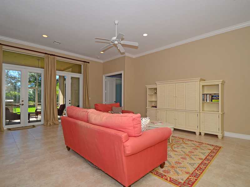 1185 River Wind Circle Vero Beach, FL 32967 - Photo 3 of 29 a living room with furniture and wooden floor