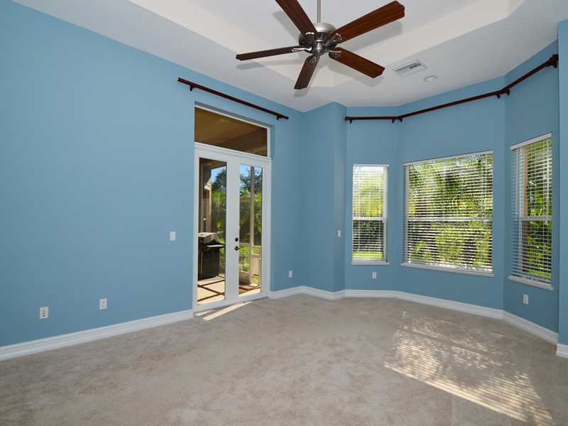 1185 River Wind Circle Vero Beach, FL 32967 - Photo 8 of 29 a view of an empty room with a window
