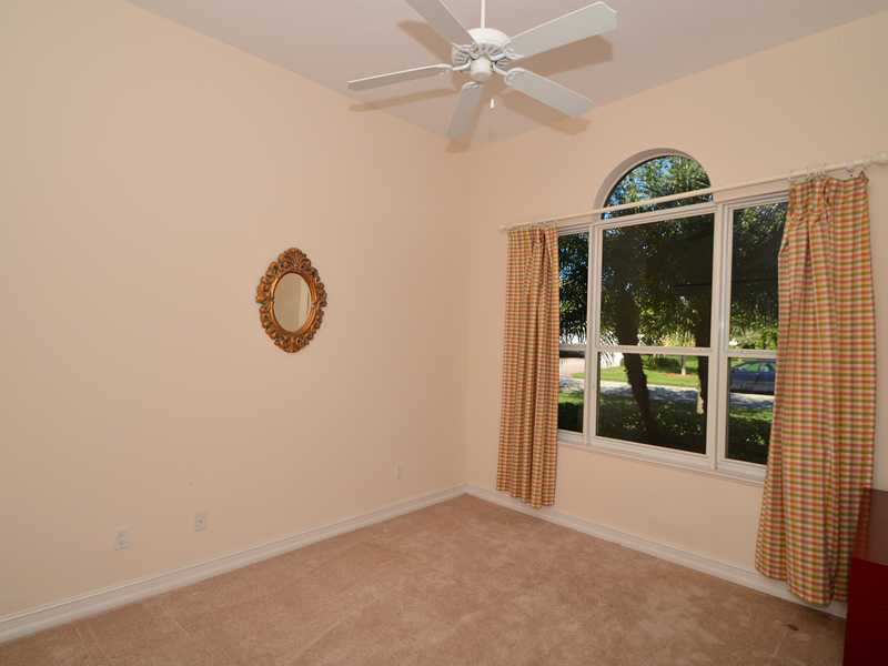 1185 River Wind Circle Vero Beach, FL 32967 - Photo 9 of 29 a view of a livingroom with glass door