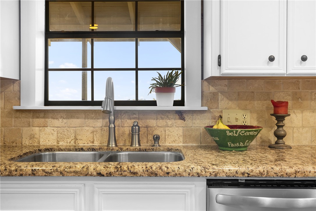 11867 Farm To Market 2159 Calvert, TX 77837 - Photo 11 of 41 a kitchen with a stove and window