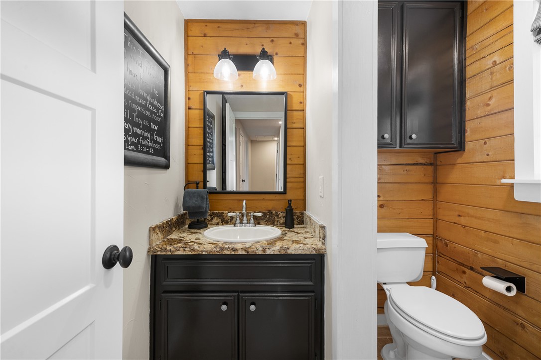 11867 Farm To Market 2159 Calvert, TX 77837 - Photo 21 of 41 a bathroom with a granite countertop toilet sink and mirror