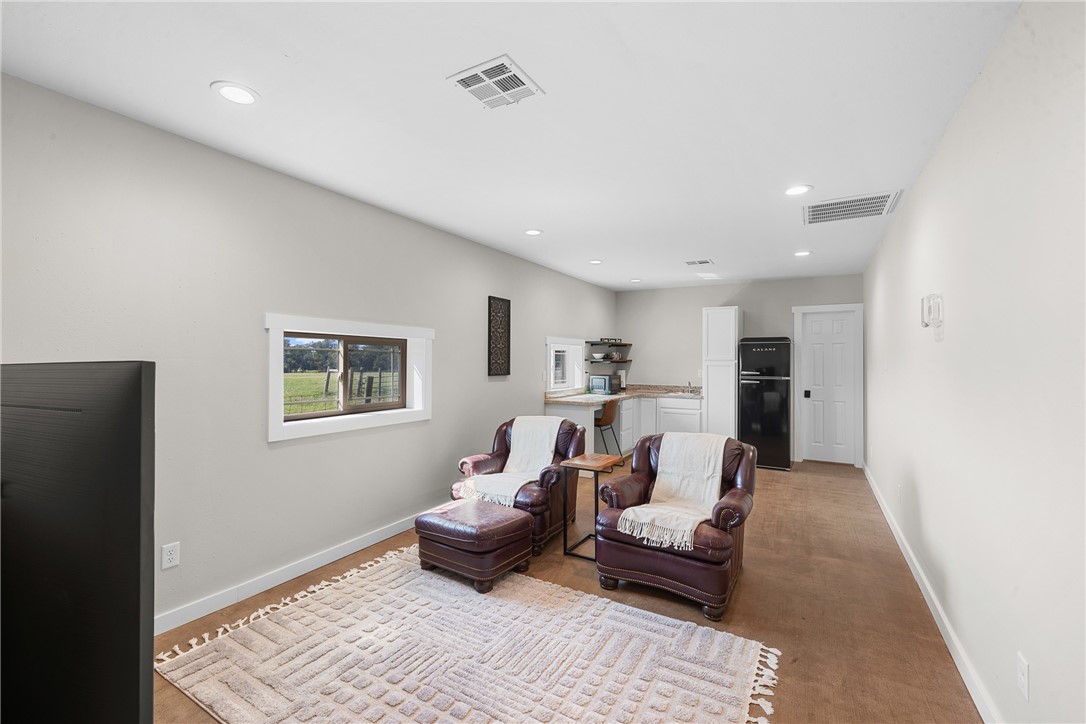 11867 Farm To Market 2159 Calvert, TX 77837 - Photo 24 of 41 a living room with furniture and a rug