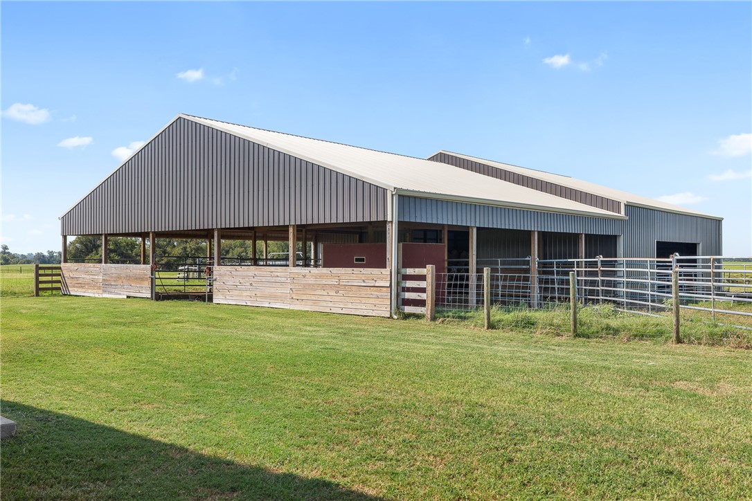 11867 Farm To Market 2159 Calvert, TX 77837 - Photo 28 of 41 a backyard of a house with table and chairs
