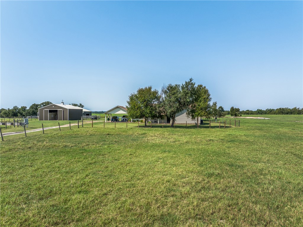 11867 Farm To Market 2159 Calvert, TX 77837 - Photo 32 of 41 a front view of a house with a yard