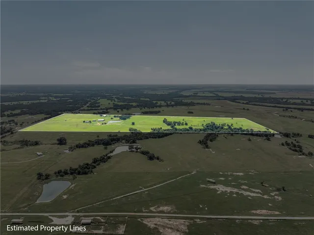 a view of a lake in middle of the house