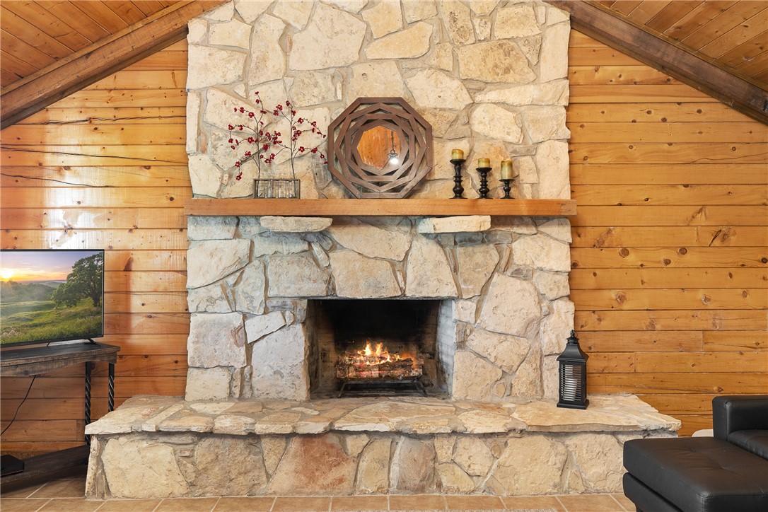 11867 Farm To Market 2159 Calvert, TX 77837 - Photo 8 of 41 a fireplace with a wooden floor