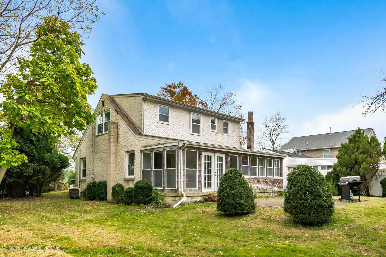 27 Maxwell Road Eatontown, NJ 07724 - Photo 22 of 23 a front view of a house with a garden
