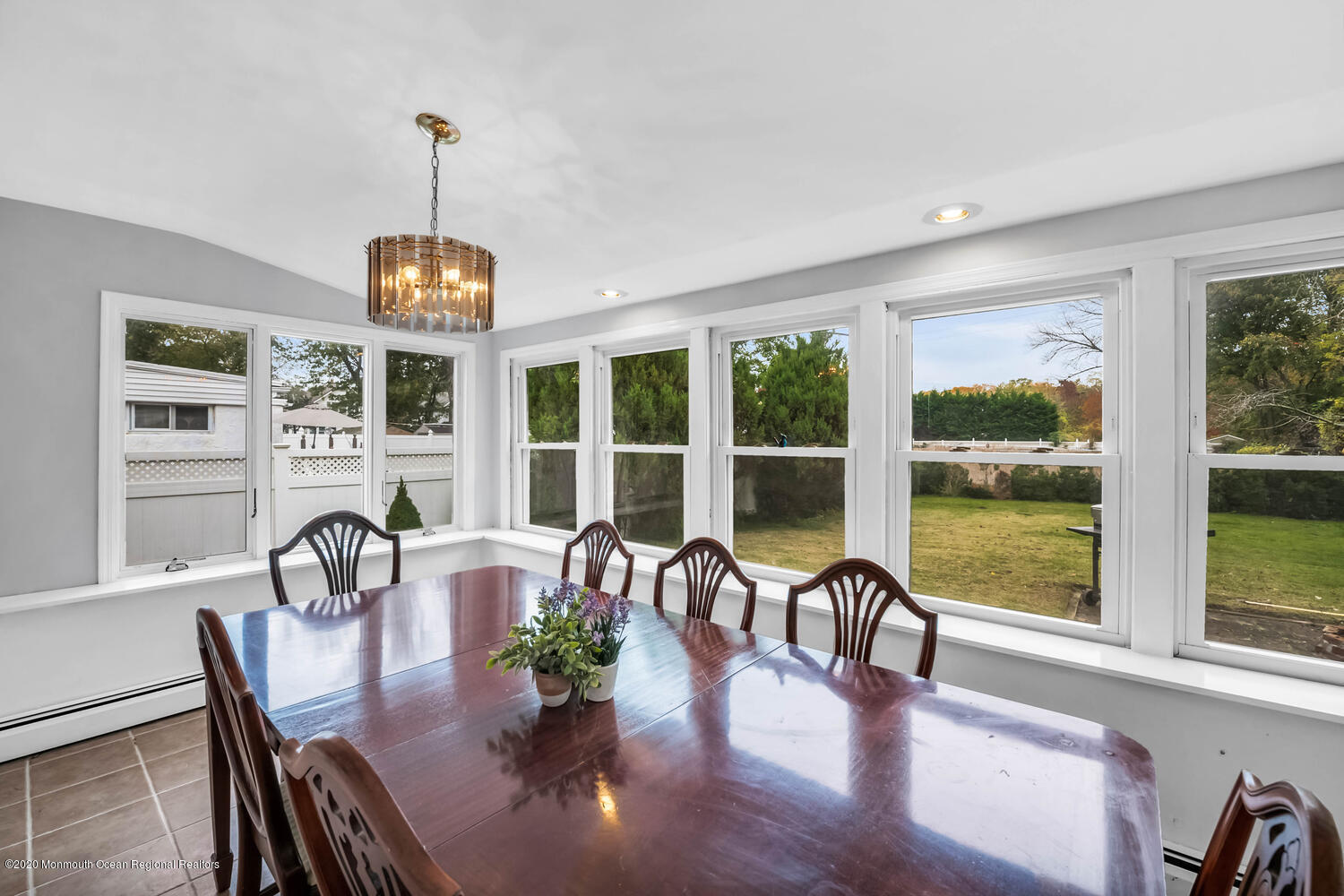 27 Maxwell Road Eatontown, NJ 07724 - Photo 8 of 23 a view of a dining room with furniture window and wooden floor