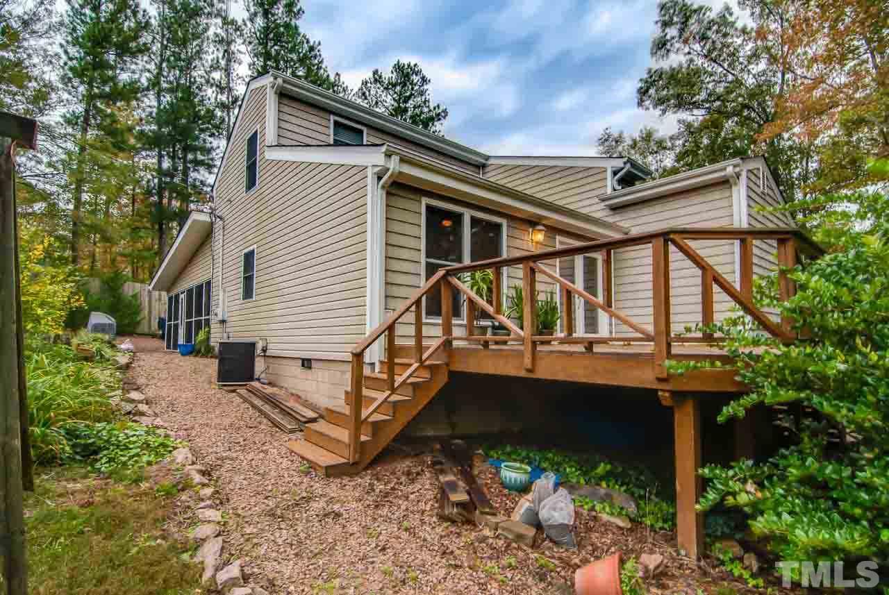 4620 Jimmy Rogers Road Durham, NC 27704 - Photo 2 of 25 a view of a house with backyard and sitting area