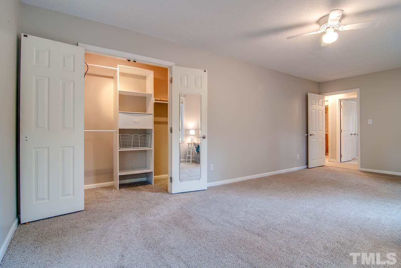 4620 Jimmy Rogers Road Durham, NC 27704 - Photo 15 of 25 a view of empty room with a fireplace