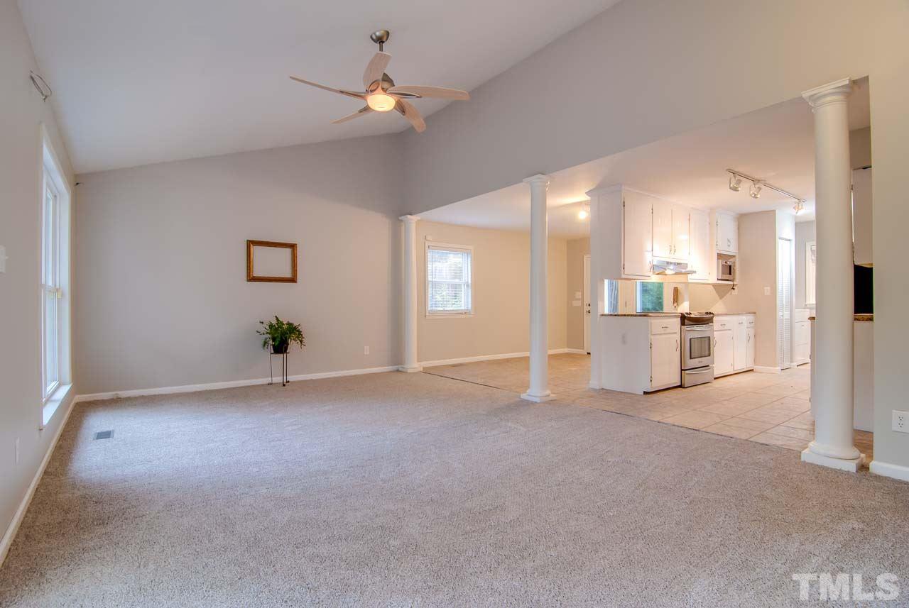 4620 Jimmy Rogers Road Durham, NC 27704 - Photo 4 of 25 a view of an empty room with a window