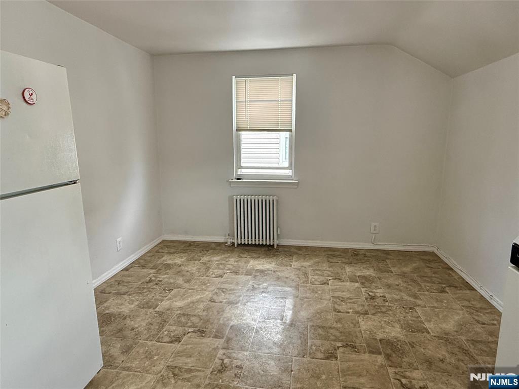 47 MacArthur Avenue, Unit 2 Lodi, NJ 07644 - Photo 6 of 6 a view of a livingroom with a window
