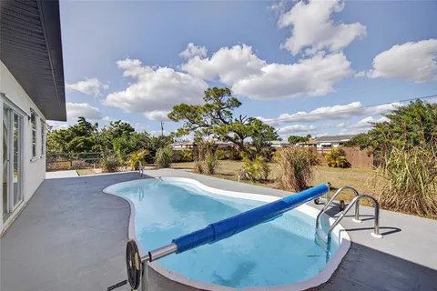 a view of a swimming pool from a balcony
