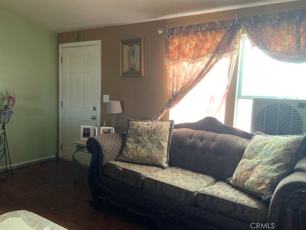 36145 Acorn Road Lucerne Valley, CA 92356 - Photo 3 of 4 a living room with furniture and a window