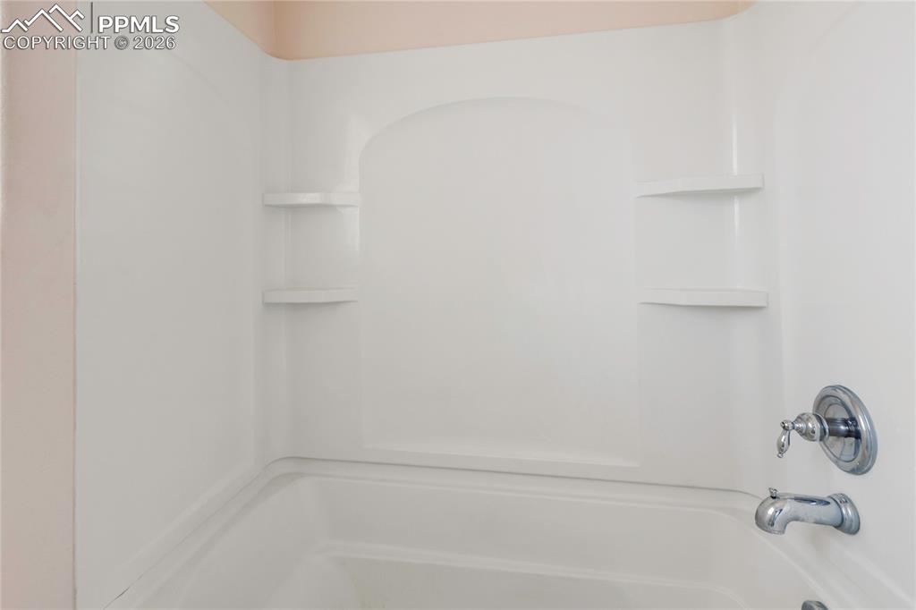 7309 Sandy Springs Point Fountain, CO 80817 - Photo 13 of 35 a bathroom with a bathtub