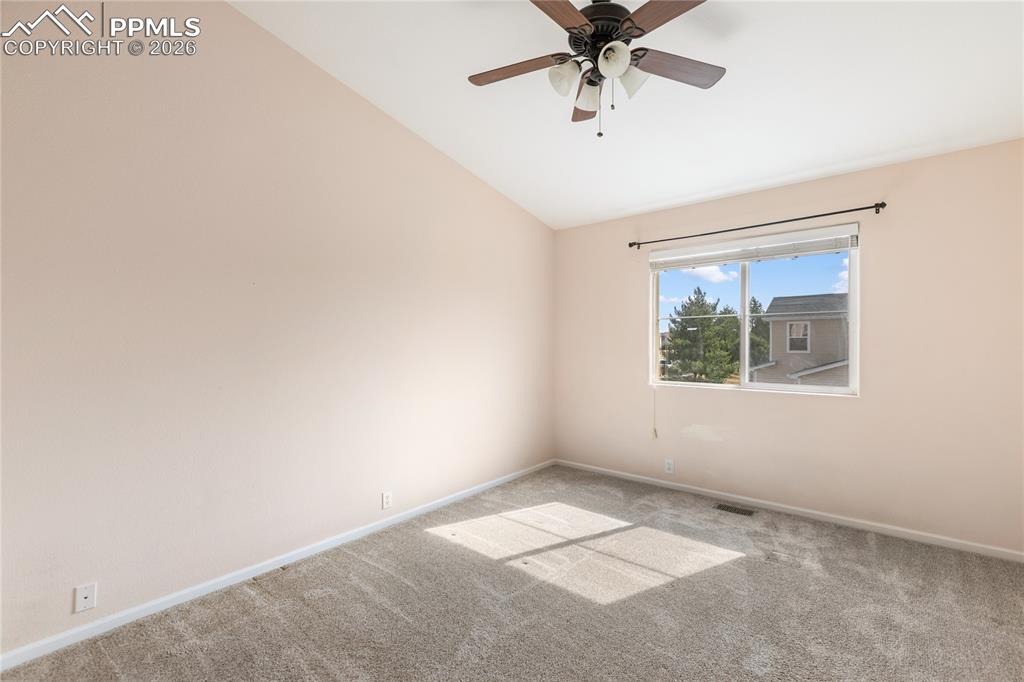 7309 Sandy Springs Point Fountain, CO 80817 - Photo 15 of 35 an empty room with a window and a fan