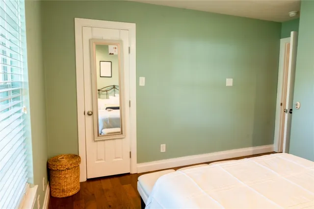 a view of a livingroom with furniture and a rug