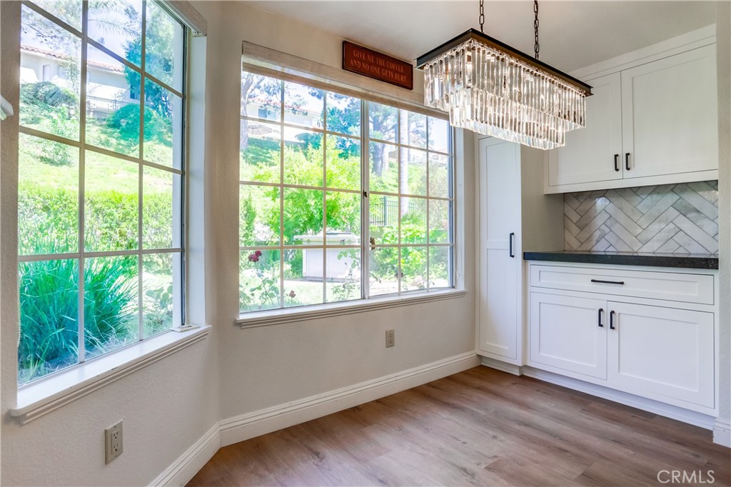 26511 Maside Mission Viejo, CA 92692 - Photo 13 of 46 a view of a kitchen with an empty space and a window